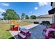 Backyard with a patio, play structure, picnic table, and grill at 13234 Great Plains Dr, Riverview, FL 33579
