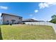 View of a spacious backyard, perfect for pets, play equipment, and outdoor lounging at 13234 Great Plains Dr, Riverview, FL 33579