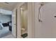 Clean bathroom with a shower and a separate toilet area at 13234 Great Plains Dr, Riverview, FL 33579