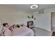 Spacious bedroom features white walls, a plush rug, and a built-in closet at 13234 Great Plains Dr, Riverview, FL 33579