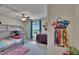 Charming ' bedroom with bunkbeds, a dresser, and colorful decor at 13234 Great Plains Dr, Riverview, FL 33579