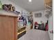 Walk-in closet with ample storage space and shelving at 13234 Great Plains Dr, Riverview, FL 33579