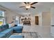 Spacious living room open to dining area and kitchen, with ample seating at 13234 Great Plains Dr, Riverview, FL 33579