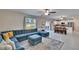 Expansive living area connecting to dining and kitchen, with backyard views at 13234 Great Plains Dr, Riverview, FL 33579