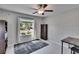 Cozy office with natural light, a ceiling fan, and a view of the neighborhood at 13234 Great Plains Dr, Riverview, FL 33579
