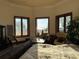 Bright main bedroom featuring ample natural light, views, and stylish furniture at 1516 Bayshore Blvd, Dunedin, FL 34698