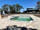 Backyard pool area featuring a spacious pool and outdoor entertaining space at 1516 Bayshore Blvd, Dunedin, FL 34698