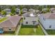 Well-maintained backyard, with a fenced in yard, and solar panels at 17331 White Mangrove Dr, Wimauma, FL 33598