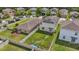Spacious backyard featuring a green lawn, offering privacy and space for outdoor activities at 17331 White Mangrove Dr, Wimauma, FL 33598