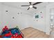 This vibrant bedroom features a closet for ample storage and decorations at 17331 White Mangrove Dr, Wimauma, FL 33598