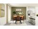 Stylish dining room with a modern table and ample seating at 17611 Happytrails St, Land O Lakes, FL 34638