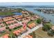 Panoramic aerial view showcases this waterside neighborhood, close to the city, and near a bay at 19 Crescent S Pl, St Petersburg, FL 33711
