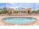 Upscale community pool area, featuring a fountain, lounge chairs, and elegant architecture for residents' enjoyment at 19 Crescent S Pl, St Petersburg, FL 33711