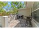 Private back patio featuring brick pavers and a seating area perfect for outdoor relaxation at 25 Harbor Oaks Cir, Safety Harbor, FL 34695