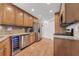 Updated kitchen featuring stainless-steel appliances and stone countertops at 25 Harbor Oaks Cir, Safety Harbor, FL 34695