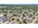 This aerial view showcases the home's location in a beautiful, walkable neighborhood with nearby water views at 3612 W Pearl Ave, Tampa, FL 33611