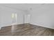 Light-filled bedroom with wood flooring at 3612 W Pearl Ave, Tampa, FL 33611