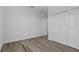 Spacious bedroom with wood flooring and walk-in closet at 3612 W Pearl Ave, Tampa, FL 33611