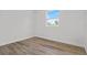 Bright bedroom with natural light and wood flooring at 3612 W Pearl Ave, Tampa, FL 33611