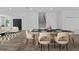 Dining room features contemporary table and chairs at 3612 W Pearl Ave, Tampa, FL 33611