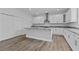 Bright and spacious kitchen with white cabinetry and granite countertops at 3612 W Pearl Ave, Tampa, FL 33611