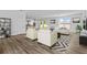 Bright living room with neutral furniture, decorative rug and open floor plan at 3612 W Pearl Ave, Tampa, FL 33611