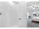 Bathroom with modern shower and view into primary bedroom at 36454 Flats St, Zephyrhills, FL 33541