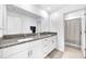 Elegant bathroom featuring a double vanity with granite countertops and neutral decor at 36454 Flats St, Zephyrhills, FL 33541