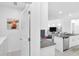 Modern kitchen with granite counters, stainless steel appliances, and an open floor plan at 36454 Flats St, Zephyrhills, FL 33541
