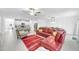 Inviting living space featuring modern decor, dining, and an open kitchen layout at 36454 Flats St, Zephyrhills, FL 33541