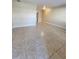 Living room with tile flooring and ample open space at 379 47Th N Ave # 104, St Petersburg, FL 33703