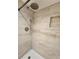 Updated shower with rainfall head, handheld sprayer and recessed niche at 379 47Th N Ave # 104, St Petersburg, FL 33703