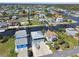 Aerial view of waterfront community highlighting canal access, docks, and the neighborhood layout at 4039 Casa Ct, Hernando Beach, FL 34607