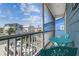 Balcony with seating area and views of the neighborhood, perfect for enjoying the outdoors at 4039 Casa Ct, Hernando Beach, FL 34607