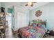 Comfortable bedroom with hardwood floors and decor at 4039 Casa Ct, Hernando Beach, FL 34607
