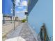 Between houses showing a well maintained walkway with stones and tile at 4039 Casa Ct, Hernando Beach, FL 34607