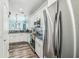 Updated kitchen includes stainless steel appliances, granite counters, and modern cabinetry at 4039 Casa Ct, Hernando Beach, FL 34607
