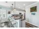 Elegant kitchen island with bar seating, offering space for meal prep and socializing at 4039 Casa Ct, Hernando Beach, FL 34607