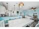 Open concept kitchen and dining area offer a spacious layout for entertaining and Gathering gatherings at 4039 Casa Ct, Hernando Beach, FL 34607