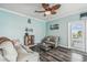 Relaxing living area with stylish decor and plenty of natural light at 4039 Casa Ct, Hernando Beach, FL 34607