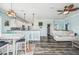 Open-concept living space with a dining area, a modern kitchen, and comfortable seating at 4039 Casa Ct, Hernando Beach, FL 34607