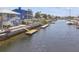 Waterfront view of a canal lined with homes, showcasing the coastal setting and dock at 4039 Casa Ct, Hernando Beach, FL 34607