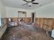 Bedroom in progress with panelling and original ceiling fan; ready to customize at 4627 W Browning Ave, Tampa, FL 33629