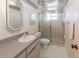 Bathroom featuring tile flooring, a vanity, a shower and a view of the water outside the window at 5200 Brittany S Dr # 1807, St Petersburg, FL 33715
