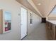 Hallway outside the unit with an exterior view and featuring a fire extinguisher box for safety at 5200 Brittany S Dr # 1807, St Petersburg, FL 33715