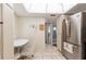Bright kitchen with tile floors, stainless steel refrigerator and adjacent breakfast nook at 5200 Brittany S Dr # 1807, St Petersburg, FL 33715