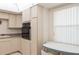 Bright kitchen featuring classic appliances, and a cozy breakfast nook with lots of natural light at 5200 Brittany S Dr # 1807, St Petersburg, FL 33715