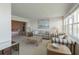Bright and comfortable living area with water views and access to bedroom at 5200 Brittany S Dr # 1807, St Petersburg, FL 33715