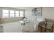 Comfortable living room with scenic water views, plush seating, and decor at 5200 Brittany S Dr # 1807, St Petersburg, FL 33715