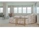 Cozy living area featuring carpet, ample windows and beautiful water views at 5200 Brittany S Dr # 1807, St Petersburg, FL 33715